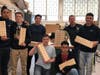 L-R: Northeast carpentry sophomores Jose Verde, of Chelsea, Brady McKinley, of Woburn, Lucky Bustamante, of Everett, Dav