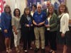 Sapphire winners Maureen Buckley, Jim Prior, and Maureen Canova are joined by Select Board at Tuesday's meeting.