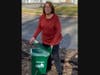 Reading resident Louise Ward sets out animal proof compost bin for weekly pickup by Black Earth Compost.