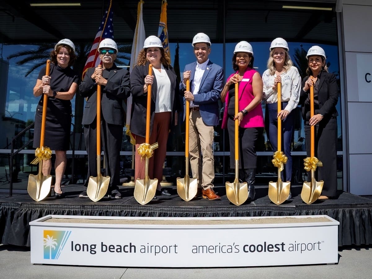 Officials participate in a groundbreaking ceremony for the Long Beach Airport's $37 million concourse upgrade project.