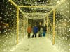 Kids enjoy the light tunnel at the 2020 Brookside Holiday Lights.