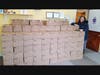 Karen DeMarco, President of Bergen County based food charity The Food Brigade Inc., with Rao's shipment