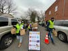 Members of The Food Brigade distributing meals in Dumont on 3/16/21