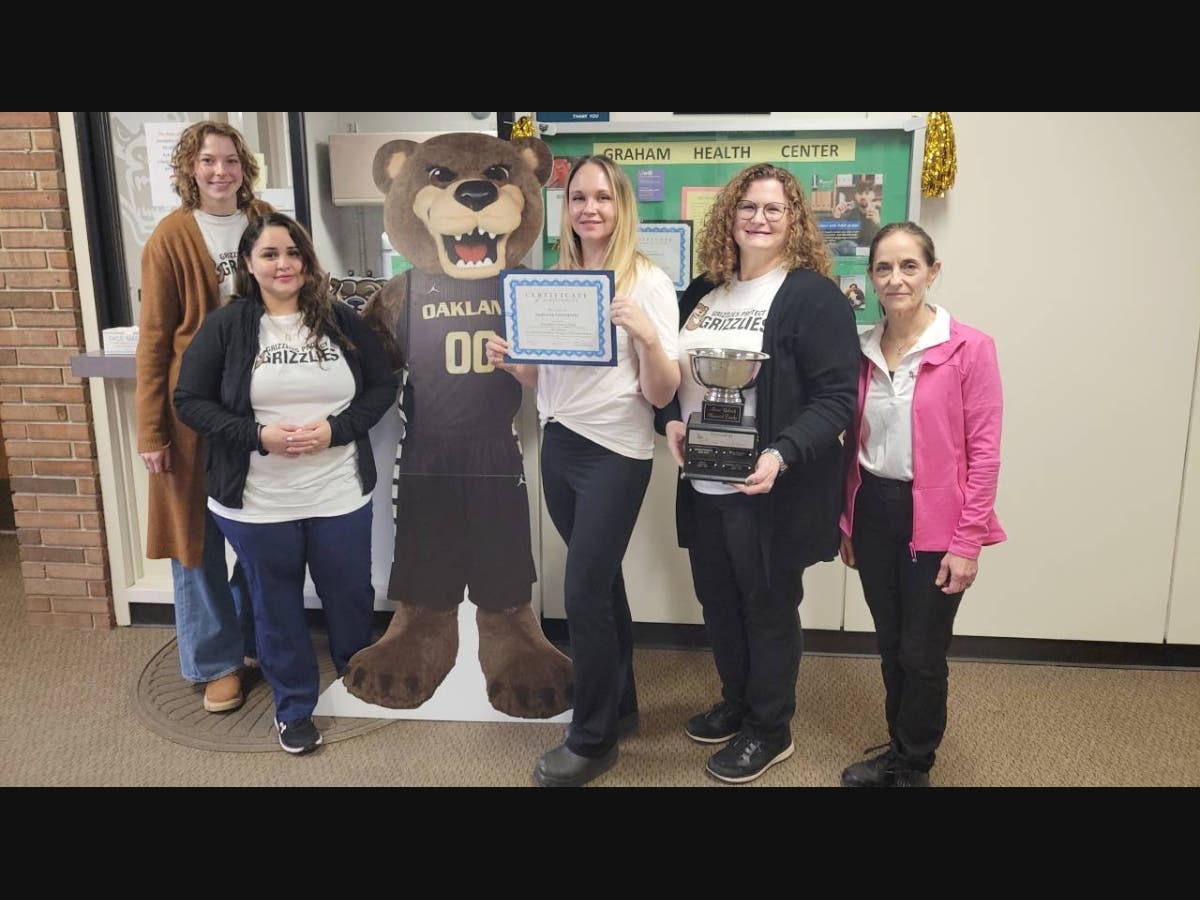 Graham Health Center staff members Sarah Dennis, Nohemi Saavedra, Liz Kreiner and Ann Rayford with with JoAnna Yaksich of Alana's Foundation.