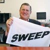 Sweep Flag Creator, Lee Hill, displays the flag.