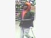 A surveillance image of the Seattle Girl Scouts thief. 