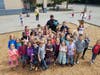 Lake Forest Park officer George Colman getting an award for work at Brookside Elementary. 