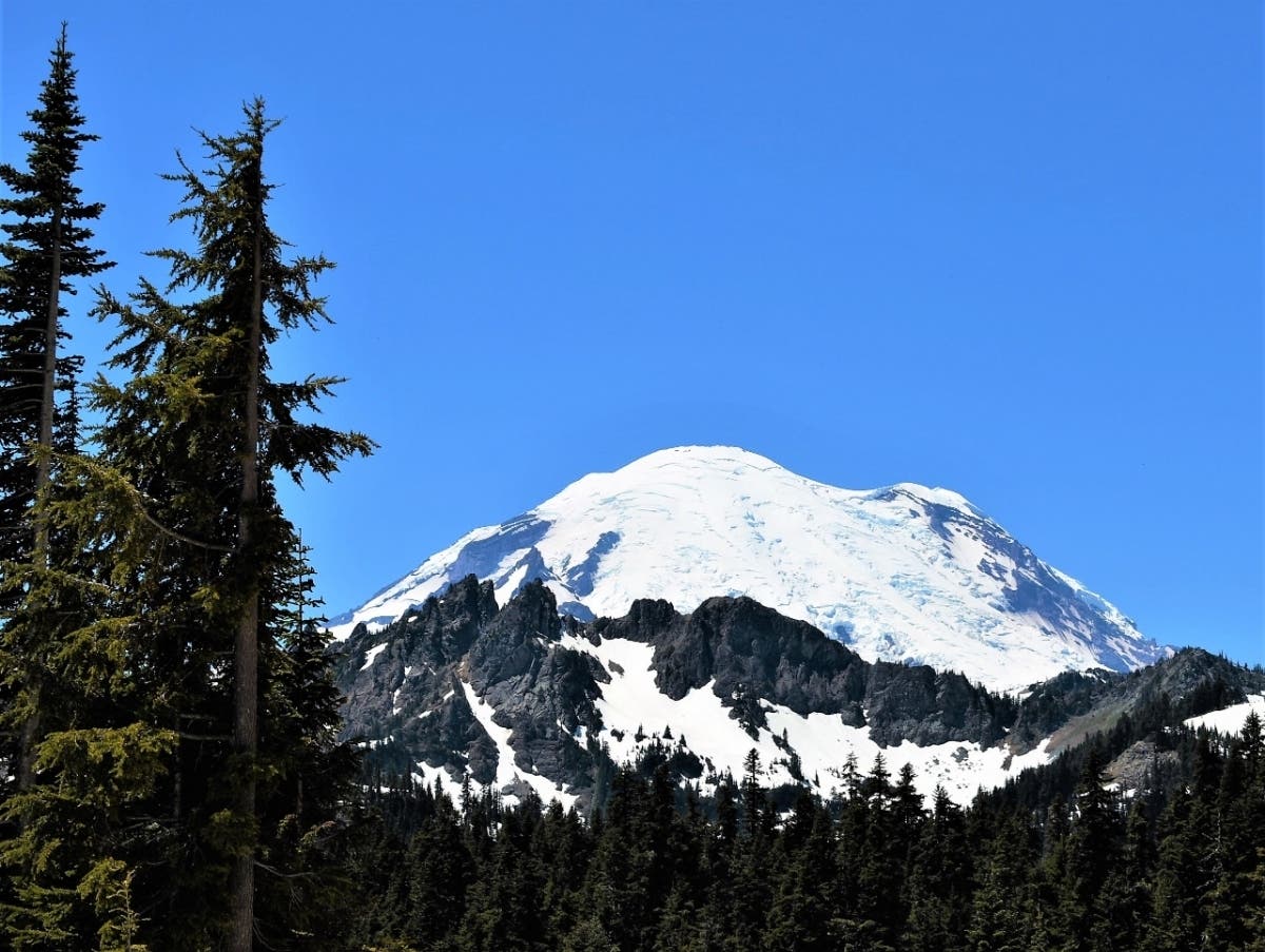 The east side of Mount Rainier as seen from SR 410 at Naches Pass. Rainier's Liberty Cap is the peak at right. 