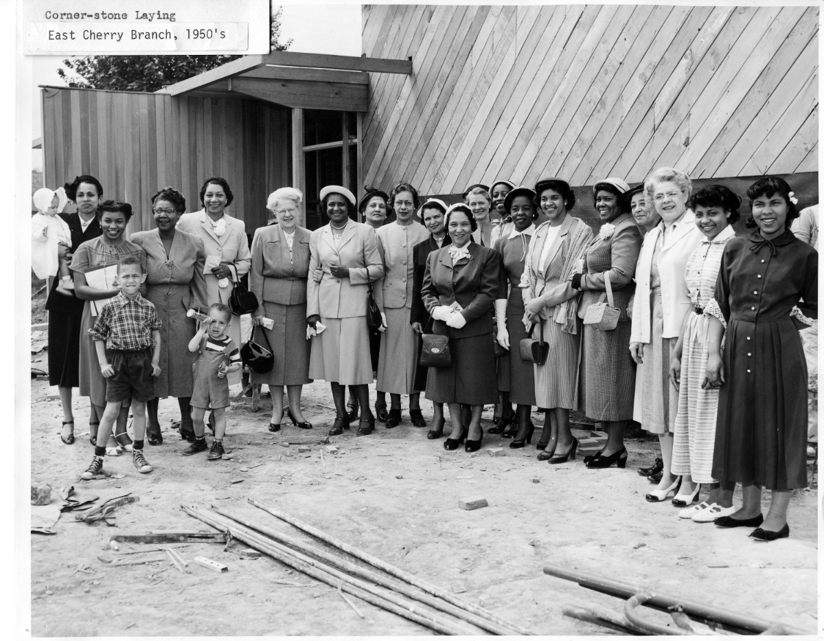 YWCA members set the cornerstone of the East Cherry Branch in 1952.