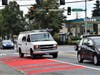 This driver entered the bus-only lane, but then veered into the travel lane, cutting another driver off. 
