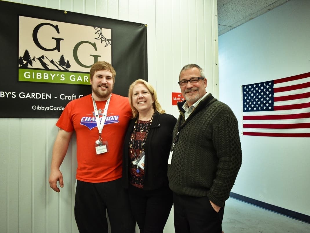 From left to right: Joe, Kimberly and Fred Gibson inside their Uxbridge cannabis facility. 