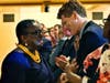 Spicer greeting U.S. Rep. Joe Kennedy III, D-Newton. 