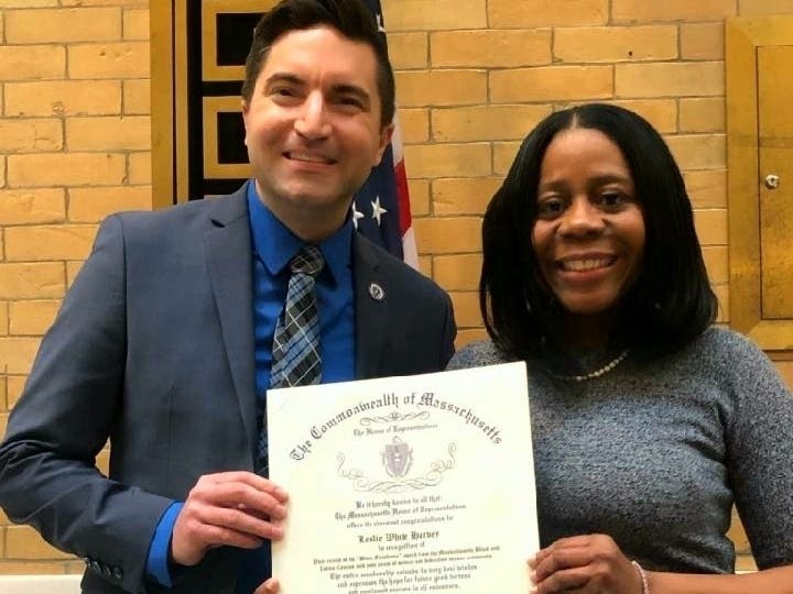 Framingham state Rep. Jack Lewis and Black Excellence Award winner Leslie White Harvey.