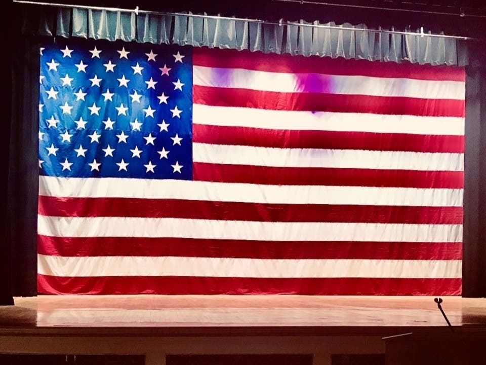 The American flag on display at Framingham's Nevins Hall. 