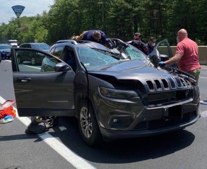 A tire slammed into Erin Beth MacKay's car on Route 2 in Fitchburg on Wednesday. 