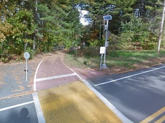 A section of the Bruce Freeman Rail Trail crossing Route 27 in Westford. 