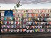 The Love 01760 installation along the pedestrian bridge over the downtown Natick train station.
