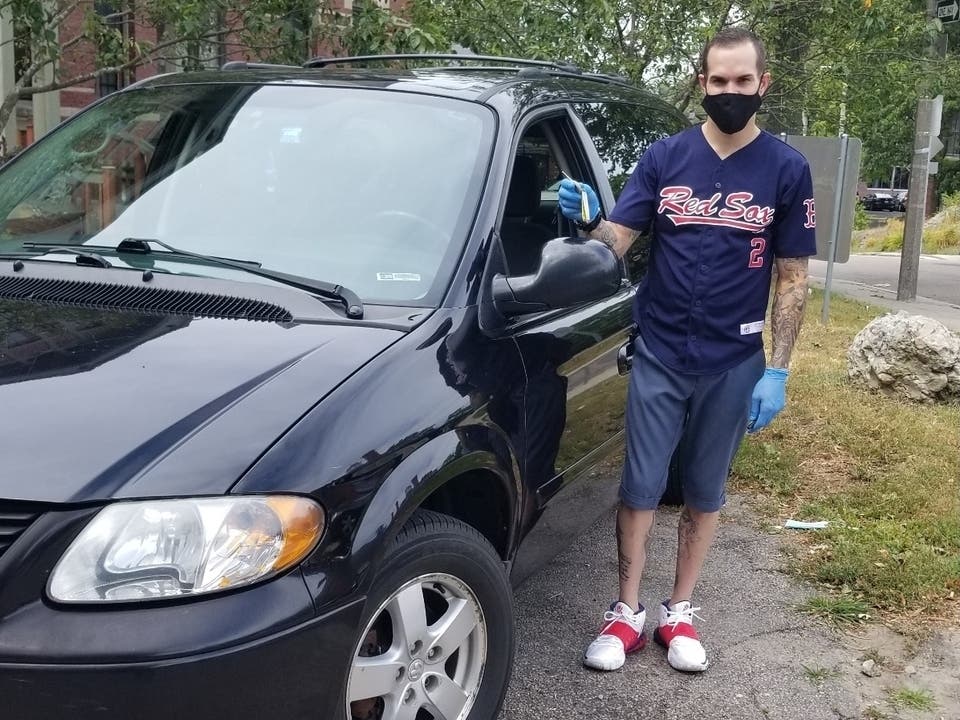 Carlos Montes, of Framingham, received a Dodge minivan from the Good News Garage. 