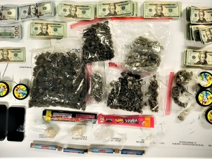A sample of items state police say they found in a car along the Mass Pike on Sept. 15. 