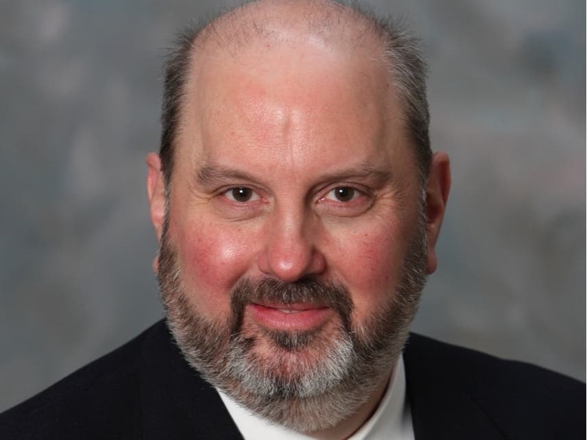 Michelangelo Bon Tempo, 58, is one of two candidates seeking to become Town Moderator.