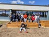 Local Boy Scouts removed old garden boxes at Wayland Middle School and built new ones with materials donated by Lynch Landscape & Tree Service. 