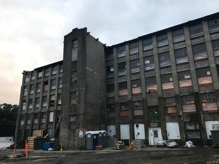 The developer of the Bancroft Building in Framingham sought, and was denied, a TIF tax break after concerns about labor practices. 