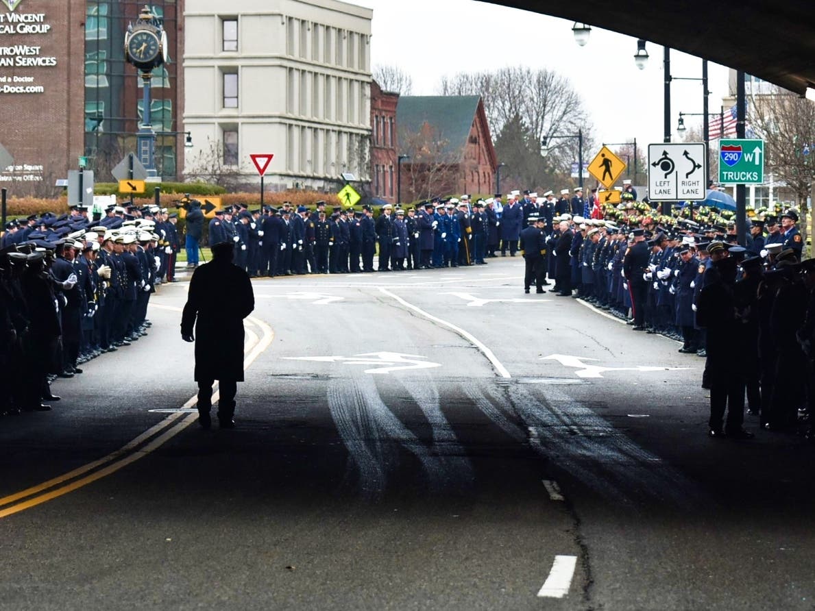 Hundreds of firefighters lined Worcester streets for firefighter Jason Menard's funeral in 2019. Expect the same type of ceremony on Thursday for Officer Enmanuel Familia. 
