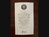 Officer Manny Familia's prayer card. 