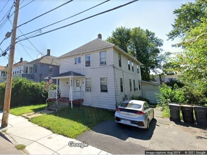 District 9 School Committee member William LaBarge's East Street home. A tenant who lives in the basement has been breeding dogs, leading to a conflict involving the police and the Board of Health. 