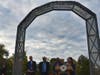 Tomo Sakai (at podium) designed the arch along with collaborator Eric Cruz.