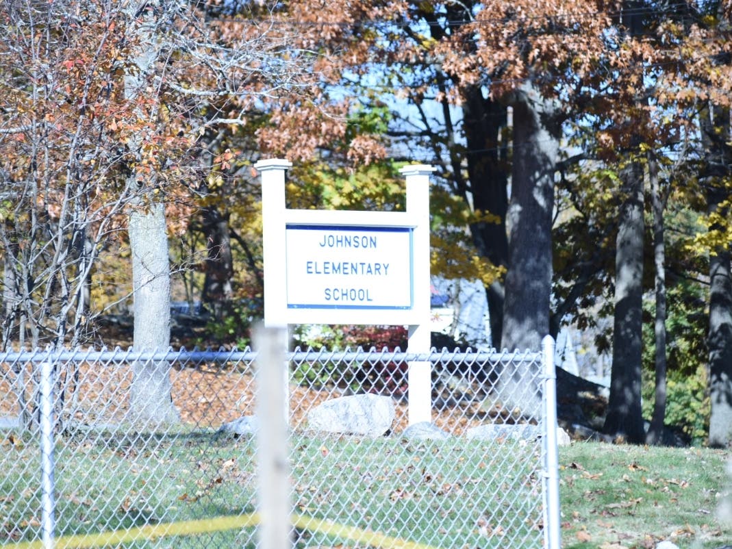 A decision around closing Johnson Elementary in Natick has become an ethics issue for one School Committee member. 