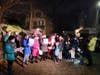 About 40 carolers showed up to sing on a Worcester street Wednesday for a woman in hospice care. 
