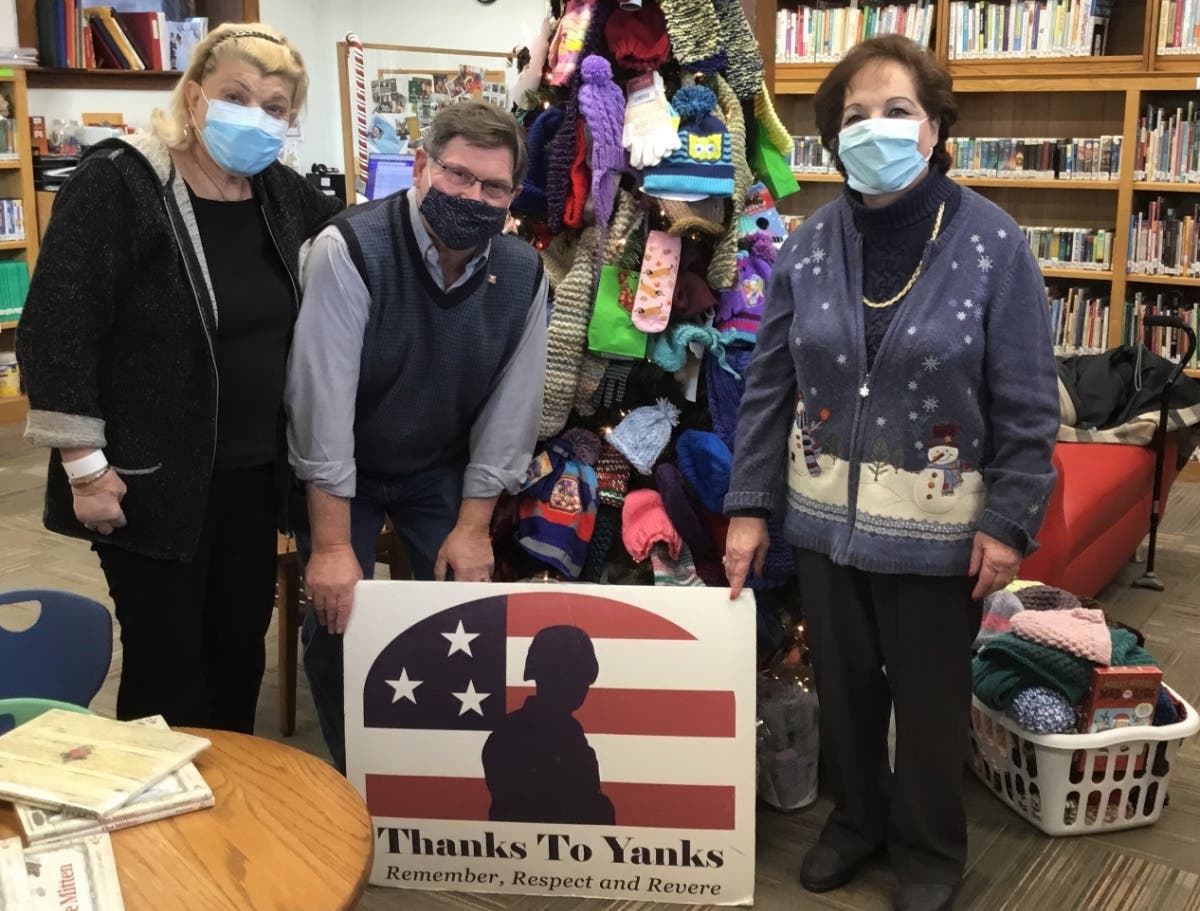 From left: Barbara Shain, Thanks To Yanks founder Michael Shain and Hopedale children's librarian Elaine Kraimer.