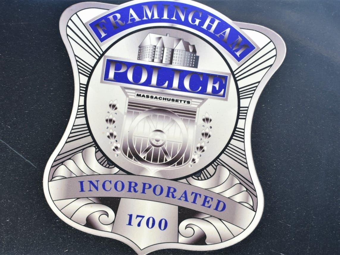 A 45-year-old man died after he was found behind a home in Framingham on Sunday. 