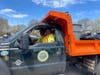 Saturday's Milford Beautification Day event netted about 13 truckloads of litter, including one unidentified animal skull. 