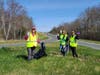Volunteers collecting garbage during Saturday's Milford Beautification Day event. 
