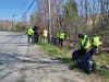 Volunteers collecting garbage during Saturday's Milford Beautification Day event. 