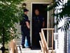 Worcester police emerge from a building along Kendall Street where a standoff took place Wednesday.