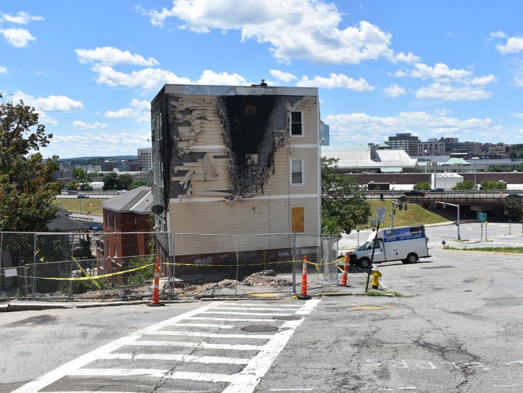 The corner where 2 Gate St. once stood before a fire in May that killed four residents.
