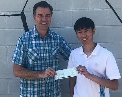 WayCAM Executive Director Jim Mullane congratulates Ethan Tse upon his receipt of the 2021 WayCAM scholarship given to a graduating senior. 