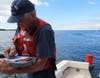 Auxiliarists conduct aids to navigation verification (buoys) to keep NOAA charts updated