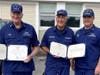 Members of the Woods Hole Flotilla receiving awards for support of Coast Guard active duty units based in Woods Hole