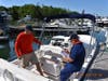 Member of Woods Hole Flotilla conducting a courtesy vessel safety check