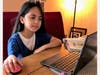 Lily S. works on her science assignment