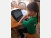 Grace B. reviews her lessons
