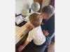 Luke B. and his Dad e-learn together