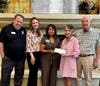 Westminster CARES Foundation presents a donation to the H-E-B Foundation to support relief efforts following the devastating July 4 floods in Texas.