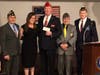 In May, 2019, Brett Reistad, Natl Commander, American Legion, received a check and a wood DoodleBug Workshop flag from Vince Morello, Warrenville Post 589; DoodleBug’s Sarah Starke; Bob Corbino, Lombard Post 391 and 11th District Commander Kevin Leonard.
