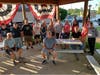 Kyle Leonard, commander of the 11th District American Legion (back row, 4th from right) is joined by members of the 11th District and the Warrenville American Legion Post 589 along with DoodleBug's Sarah Starke and members of the Blue Star Mothers.