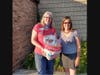 Sonya Stowers, Chicagoland Blue Star Mothers and Sarah Starke, executive director, DoodleBug Workshop with some of the collected letters
